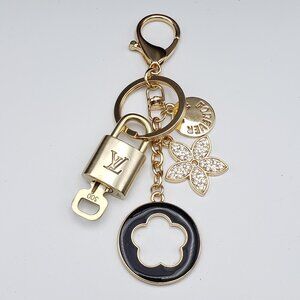 Authentic Louis Vuitton Lock & Key with Unbranded Flower Charm, Keychain